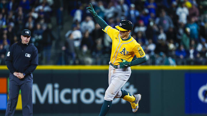 Mar 27, 2025; Seattle, Washington, USA; Athletics first baseman Tyler Soderstrom (21) celebrates while running the bases after hitting a solo-home run against the Seattle Mariners during the eighth inning at T-Mobile Park. Mandatory Credit: Joe Nicholson-Imagn Images Mar 27, 2025; Seattle, Washington, USA; Athletics first baseman Tyler Soderstrom (21) celebrates while running the bases after hitting a solo-home run against the Seattle Mariners during the eighth inning at T-Mobile Park. Mandatory Credit: Joe Nicholson-Imagn Images