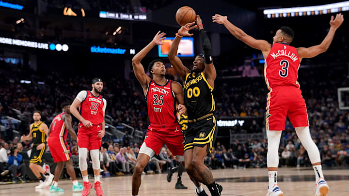 Jan 10, 2024; San Francisco, California, USA; Golden State Warriors forward Jonathan Kuminga (00) is fouled by New Orleans Pelicans forward Trey Murphy III (25) while driving to the hoop in the second quarter at the Chase Center. Mandatory Credit: Cary Edmondson-Imagn Images Jan 10, 2024; San Francisco, California, USA; Golden State Warriors forward Jonathan Kuminga (00) is fouled by New Orleans Pelicans forward Trey Murphy III (25) while driving to the hoop in the second quarter at the Chase Center. Mandatory Credit: Cary Edmondson-Imagn Images