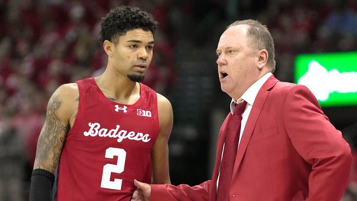 Wisconsin guard Nick Boyd listens to head coach Greg Gard.