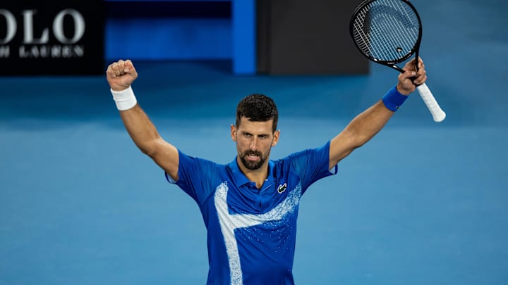 Jan 22, 2025; Melbourne, Victoria, Australia; Novak Djokovic of Serbia celebrates during his match against Carlos Alcaraz of Spain in the quarterfinals of the men's singles at the 2025 Australian Open at Melbourne Park. Mandatory Credit: Mike Frey-Imagn Images