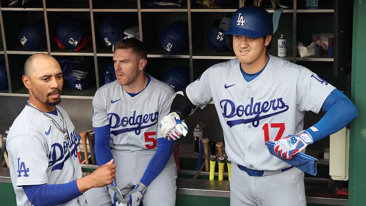 Jun 9, 2026; Pittsburgh, Pennsylvania, USA; Los Angeles Dodgers shortstop Mookie Betts (50) and designated hitter Shohei Ohtani (17) and first baseman Freddie Freeman (5) prepare in the dugout before the first inning against the Pittsburgh Pirates at PNC Park. Mandatory Credit: Charles LeClaire-Imagn Images Jun 9, 2026; Pittsburgh, Pennsylvania, USA; Los Angeles Dodgers shortstop Mookie Betts (50) and designated hitter Shohei Ohtani (17) and first baseman Freddie Freeman (5) prepare in the dugout before the first inning against the Pittsburgh Pirates at PNC Park. Mandatory Credit: Charles LeClaire-Imagn Images