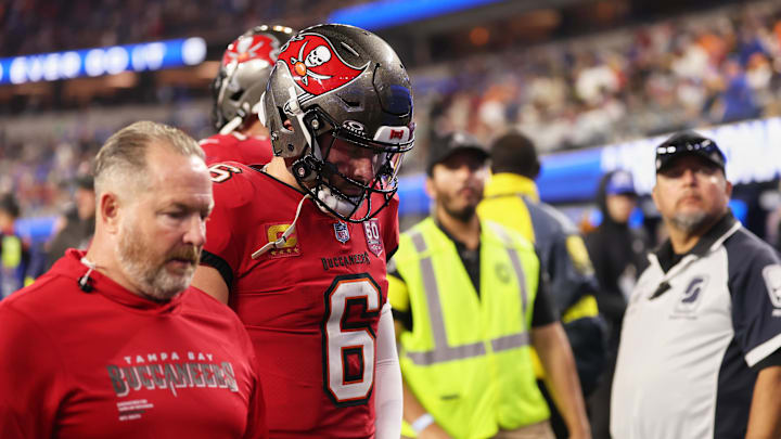 Nov 23, 2025; Inglewood, California, USA; Tampa Bay Buccaneers quarterback Baker Mayfield (6) walks off the field at halftime with an apparent injury against the Los Angeles Rams at SoFi Stadium. Mandatory Credit: Kiyoshi Mio-Imagn Images