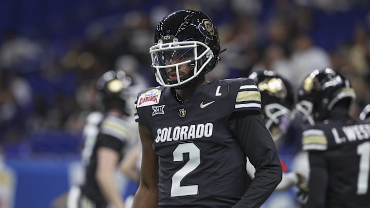 Dec 28, 2024; San Antonio, TX, USA; Colorado Buffaloes quarterback Shedeur Sanders (2) warms up before the game against the Brigham Young Cougars at Alamodome. Mandatory Credit: Troy Taormina-Imagn Images