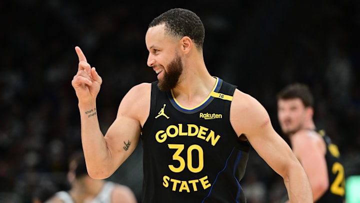 Golden State Warriors guard Stephen Curry (30) reacts in the fourth quarter against the Milwaukee Bucks at Fiserv Forum.