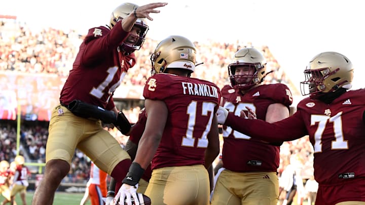 Nov 9, 2024; Chestnut Hill, Massachusetts, USA; Boston College Eagles quarterback Grayson James (14) celebrates with tight end Jeremiah Franklin (17) after a touchdown against the Syracuse Orange during the second half at Alumni Stadium. Mandatory Credit: Brian Fluharty-Imagn Images Nov 9, 2024; Chestnut Hill, Massachusetts, USA; Boston College Eagles quarterback Grayson James (14) celebrates with tight end Jeremiah Franklin (17) after a touchdown against the Syracuse Orange during the second half at Alumni Stadium. Mandatory Credit: Brian Fluharty-Imagn Images