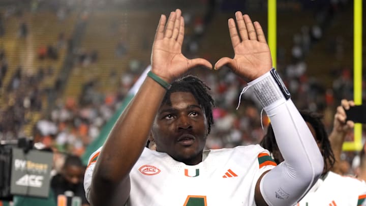 Oct 5, 2024; Berkeley, California, USA; Miami Hurricanes quarterback Cam Ward (1) gestures after defeating the California Golden Bears at California Memorial Stadium. Mandatory Credit: Darren Yamashita-Imagn Images