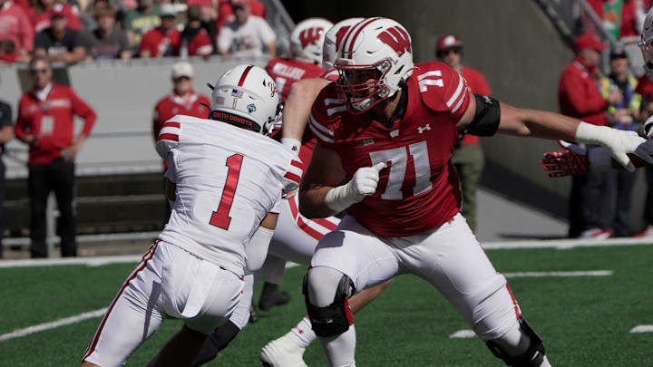 Wisconsin offensive lineman Riley Mahlman (71) provides pass protection during the second quarter of their game against South Dakota Saturday, September 7 , 2024 at Camp Randall Stadium in Madison, Wisconsin.