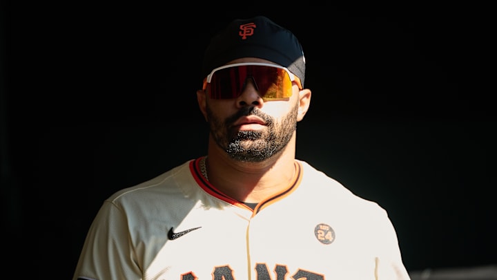 Sep 28, 2024; San Francisco, California, USA; San Francisco Giants infielder LaMonte Wade Jr. (31) walks in the dugout before the game between the St. Louis Cardinals and the San Francisco Giants at Oracle Park. 