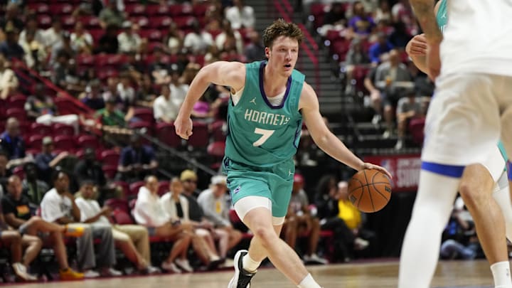 Jul 14, 2025; Las Vegas, NV, USA; Charlotte Hornets guard Kon Knueppel (7) dribbles the ball against the Dallas Mavericks during the second half of a NBA basketball game at the Thomas & Mack Center. Mandatory Credit: Lucas Peltier-Imagn Images