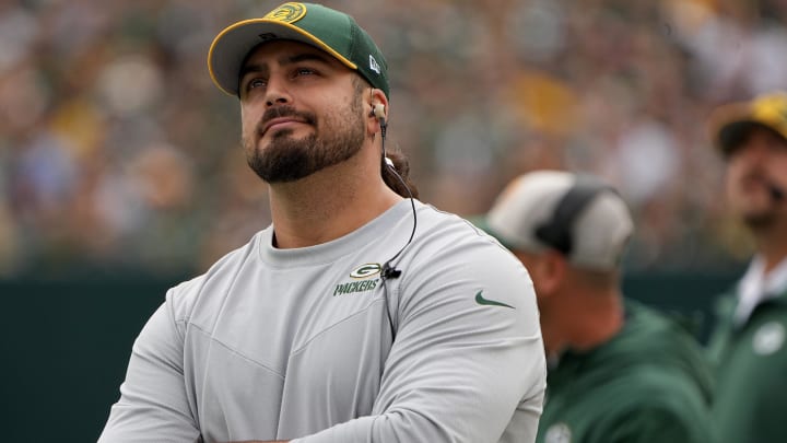 Sep 24, 2023; Green Bay, Wisconsin, USA; Injured Green Bay Packers offensive tackle David Bakhtiari watches his team during the first quarter of their game against the New Orleans Saints at Lambeau Field.Sports