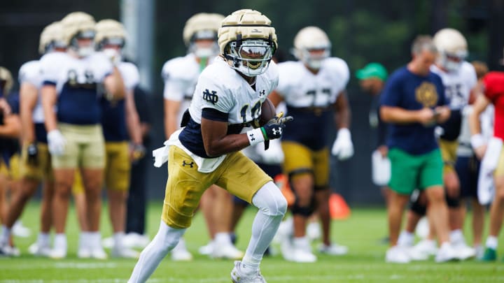 Notre Dame wide receiver Kris Mitchell runs the ball up the field during a Notre Dame football practice at Irish Athletic Center on Tuesday, Aug. 6, 2024, in South Bend. Notre Dame wide receiver Kris Mitchell runs the ball up the field during a Notre Dame football practice at Irish Athletic Center on Tuesday, Aug. 6, 2024, in South Bend.