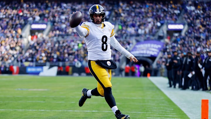 Dec 7, 2025; Baltimore, Maryland, USA; Pittsburgh Steelers quarterback Aaron Rodgers (8) scores a touchdown against the Baltimore Ravens during the first half at M&T Bank Stadium. Mandatory Credit: Peter Casey-Imagn Images