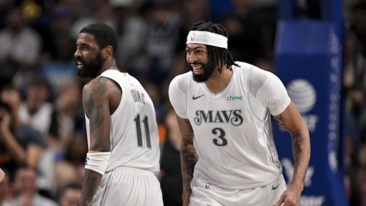 Feb 8, 2025; Dallas, Texas, USA; Dallas Mavericks forward Anthony Davis (3) and guard Kyrie Irving (11) celebrates after Davis dunks the ball during the game between the Dallas Mavericks and the Houston Rockets at the American Airlines Center. Mandatory Credit: Jerome Miron-Imagn Images