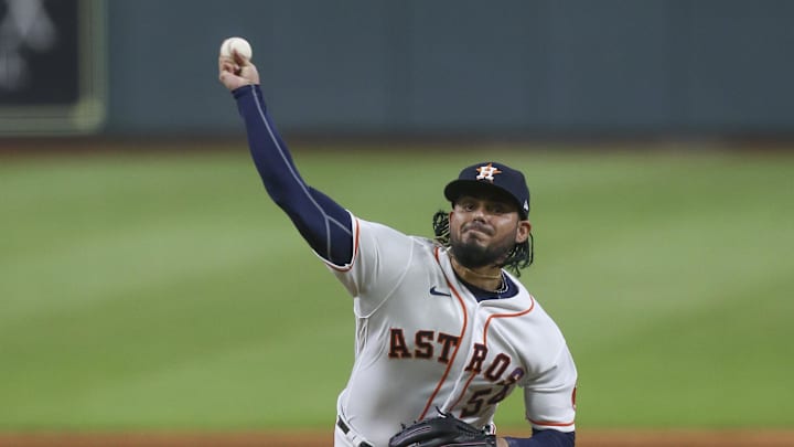 Houston Astros relief pitcher Roberto Osuna (54) pitches against the Seattle Mariners in the ninth inning at Minute Maid Park in 202. Houston Astros relief pitcher Roberto Osuna (54) pitches against the Seattle Mariners in the ninth inning at Minute Maid Park in 202.
