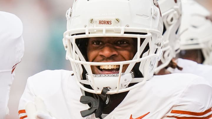 Texas White team wide receiver Isaiah Bond (7) celebrates scoring a touchdown in the fourth quarter of the Longhorns' spring Orange and White game at Darrell K Royal Texas Memorial Stadium in Austin, Texas, April 20, 2024. Texas White team wide receiver Isaiah Bond (7) celebrates scoring a touchdown in the fourth quarter of the Longhorns' spring Orange and White game at Darrell K Royal Texas Memorial Stadium in Austin, Texas, April 20, 2024.
