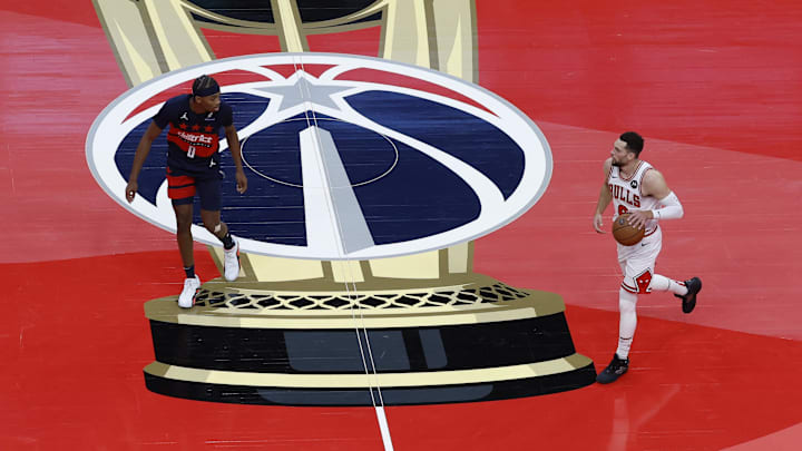 Nov 26, 2024; Washington, District of Columbia, USA; Chicago Bulls guard Zach LaVine (8) dribbles the ball as Washington Wizards guard Bilal Coulibaly (0) defends in the first quarter at Capital One Arena. Mandatory Credit: Geoff Burke-Imagn Images