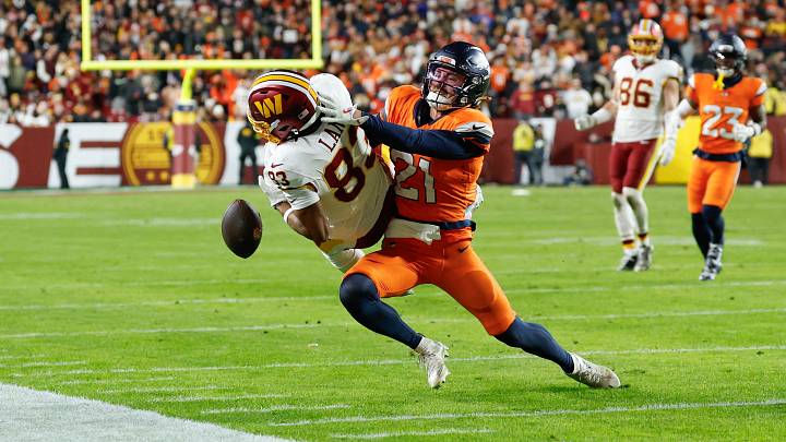 Nov 30, 2025; Landover, Maryland, USA; Washington Commanders wide receiver Jaylin Lane (83) is unable to make a reception defended by Denver Broncos cornerback Riley Moss (21) in the first quarter of the game at Northwest Stadium. Mandatory Credit: Geoff Burke-Imagn Images Nov 30, 2025; Landover, Maryland, USA; Washington Commanders wide receiver Jaylin Lane (83) is unable to make a reception defended by Denver Broncos cornerback Riley Moss (21) in the first quarter of the game at Northwest Stadium. Mandatory Credit: Geoff Burke-Imagn Images
