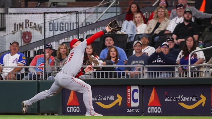 May 5, 2025; Atlanta, Georgia, USA; Cincinnati Reds right fielder Jake Fraley (27) catches a fly ball against the Atlanta Braves in the seventh inning at Truist Park. Mandatory Credit: Brett Davis-Imagn Images