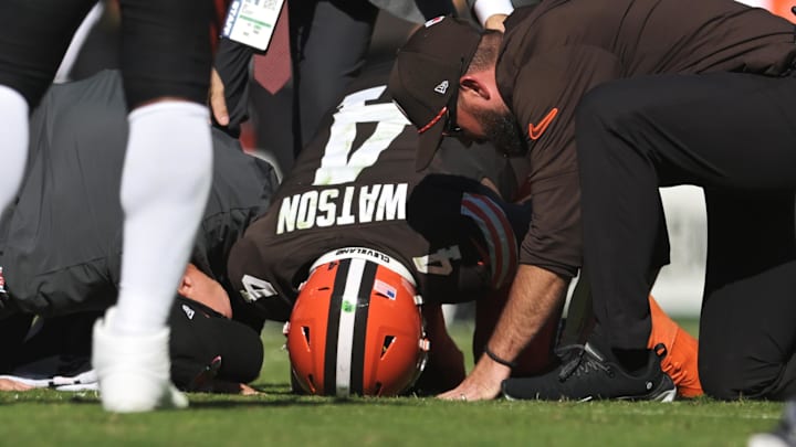 Oct 20, 2024; Cleveland, Ohio, USA; Cleveland Browns quarterback Deshaun Watson (4) lies on the ground after being injured during the first half against the Cincinnati Bengals at Huntington Bank Field. Mandatory Credit: Ken Blaze-Imagn Images