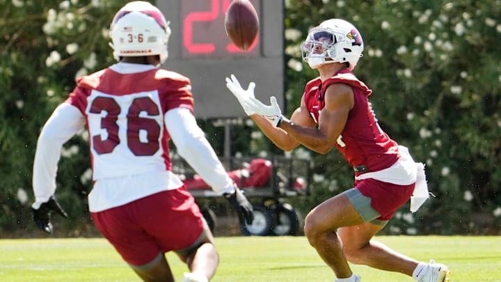 Arizona Cardinals wide receiver Michael Wilson (14) catches the punt during minicamp at the