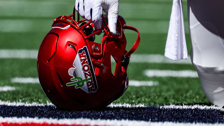 Oct 4, 2025; Tucson, Arizona, USA; The helmet of an Arizona Wildcats player is seen in the end zone before the ga,e against the Oklahoma State Cowboys at Arizona Stadium. Mandatory Credit: Aryanna Frank-Imagn Images