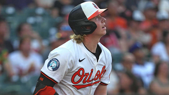 Jun 27, 2024; Baltimore, Maryland, USA; Baltimore Orioles outfielder Heston Kjerstad (13) hits a two-run home run in the third inning against the Texas Rangers at Oriole Park at Camden Yards