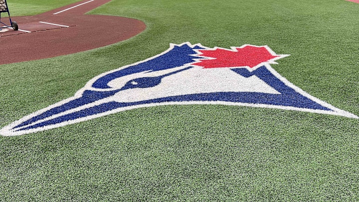 The Toronto Blue Jays logo during batting practice against the Cleveland Guardians at Rogers Centre.