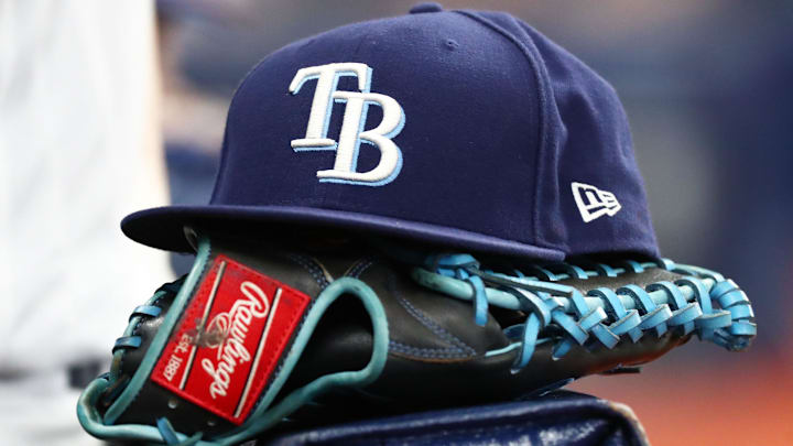 Sep 6, 2019; St. Petersburg, FL, USA; A detail view of a Tampa Bay Rays hat and glove at Tropicana Field. Sep 6, 2019; St. Petersburg, FL, USA; A detail view of a Tampa Bay Rays hat and glove at Tropicana Field.