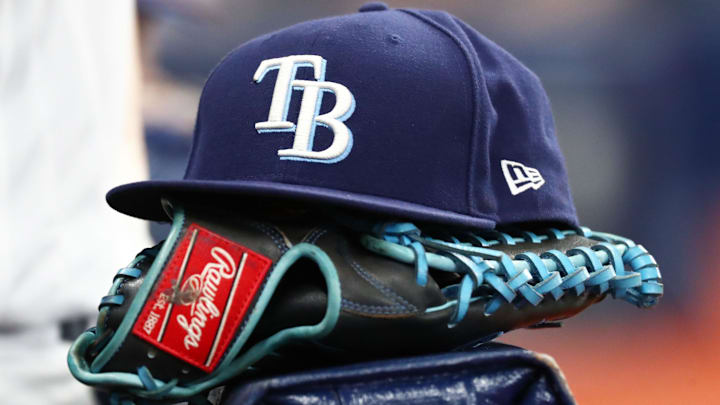Sep 6, 2019; St. Petersburg, FL, USA; A detail view of a Tampa Bay Rays hat and glove at Tropicana Field.