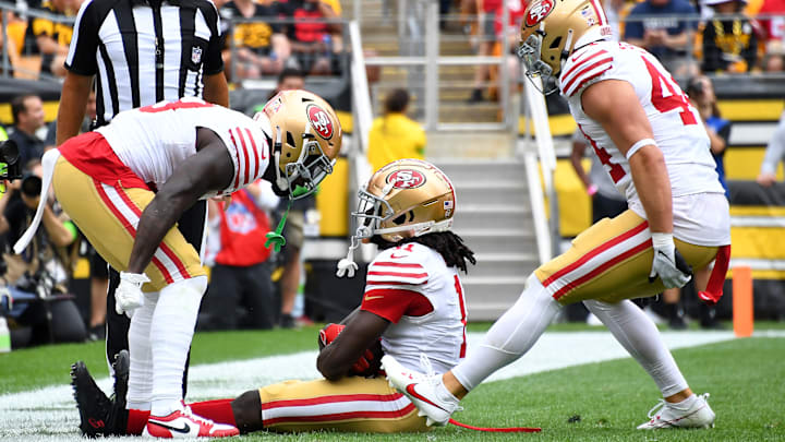 San Francisco 49ers wide receiver Brandon Aiyuk (11) celebrates with wide receiver Deebo Samuel (19) and fullback Kyle Juszczyk (44)