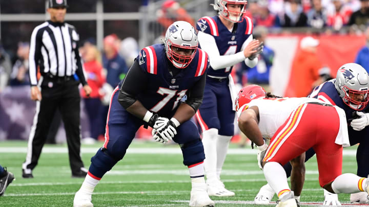 Dec 17, 2023; Foxborough, Massachusetts, USA; New England Patriots guard Mike Onwenu (71) lines up against the Kansas City Chiefs during the second half at Gillette Stadium. Mandatory Credit: Eric Canha-USA TODAY Sports Dec 17, 2023; Foxborough, Massachusetts, USA; New England Patriots guard Mike Onwenu (71) lines up against the Kansas City Chiefs during the second half at Gillette Stadium. Mandatory Credit: Eric Canha-USA TODAY Sports