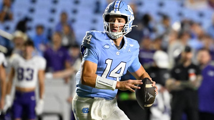 Sep 1, 2025; Chapel Hill, North Carolina, USA; North Carolina Tar Heels quarterback Max Johnson (14) looks to pass in the third quarter at Kenan Stadium. Mandatory Credit: Bob Donnan-Imagn Images