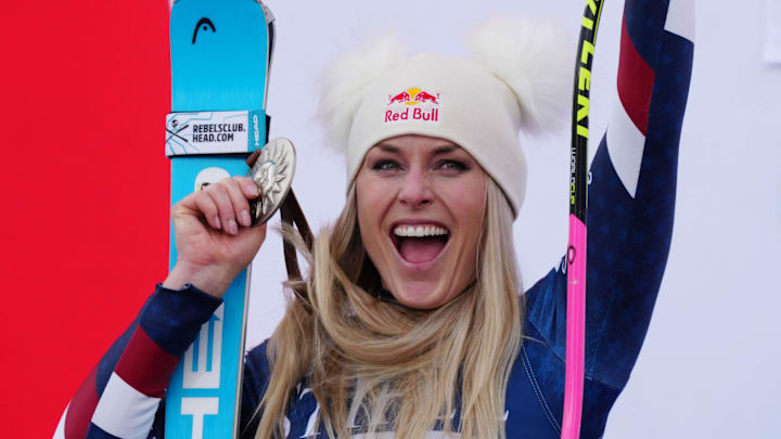 Mar 23, 2025; Sun Valley, ID, USA; Lindsey Vonn of the United States celebrates on the podium after her second place finish in the Super G alpine skiing race in the 2025 FIS Ski World Cup at Sun Valley. Mar 23, 2025; Sun Valley, ID, USA; Lindsey Vonn of the United States celebrates on the podium after her second place finish in the Super G alpine skiing race in the 2025 FIS Ski World Cup at Sun Valley.
