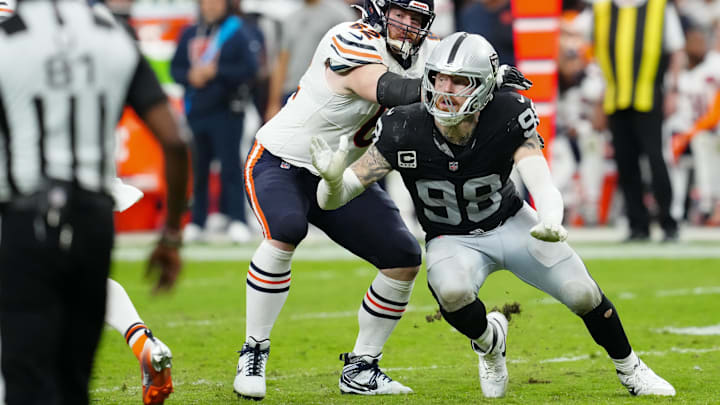 Sep 28, 2025; Paradise, Nevada, USA; Chicago Bears guard Joe Thuney (62) attempts to stop Las Vegas Raiders defensive end Maxx Crosby (98) during the second half at Allegiant Stadium.