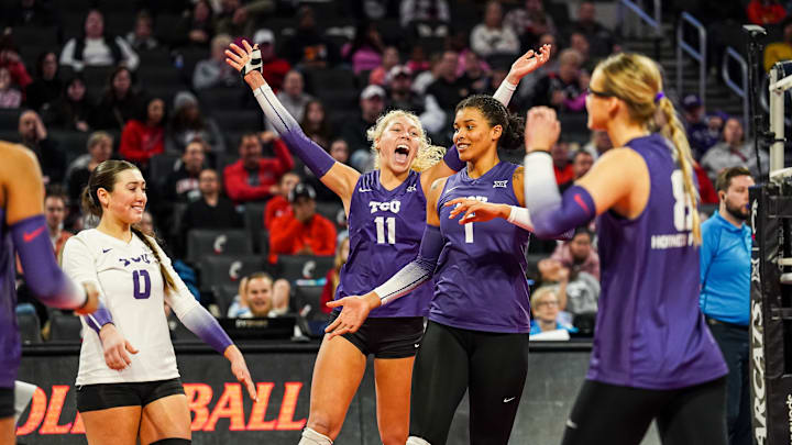 Nov. 29, 2024-TCU volleyball players celebrate a point in their win over Cincinnati. Pictured are Becca Kelley (11), Alice Volpe (0), Alexis Roberson (1) and Stephanie Young (8).