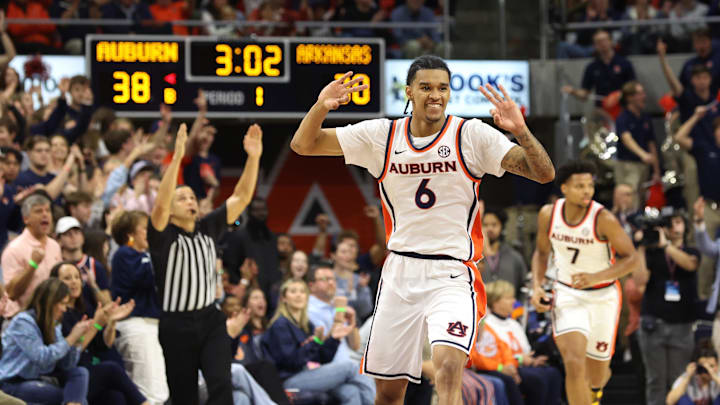 Jan 10, 2026; Auburn, Alabama, USA;  Auburn Tigers guard Elyjah Freeman (6) celebrates after making a three point shot against the Arkansas Razorbacks during the first half at Neville Arena. Mandatory Credit: John Reed-Imagn Images
