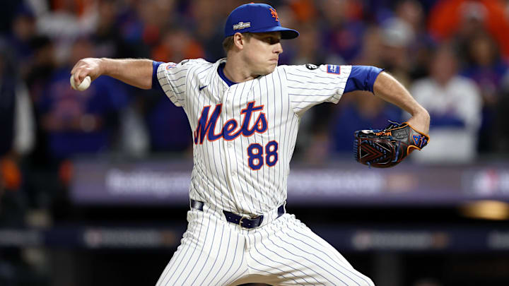 Oct 8, 2024; New York City, New York, USA; New York Mets pitcher Phil Maton (88) pitches against the Philadelphia Phillies in the eighth inning during game three of the NLDS for the 2024 MLB Playoffs at Citi Field. Mandatory Credit: Vincent Carchietta-Imagn Images