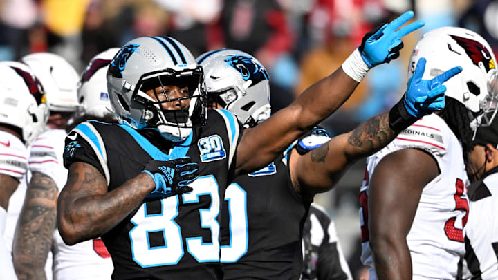 Dec 22, 2024; Charlotte, North Carolina, USA; Carolina Panthers wide receiver David Moore (83) signals first down in the first quarter at Bank of America Stadium. Mandatory Credit: Bob Donnan-Imagn Images