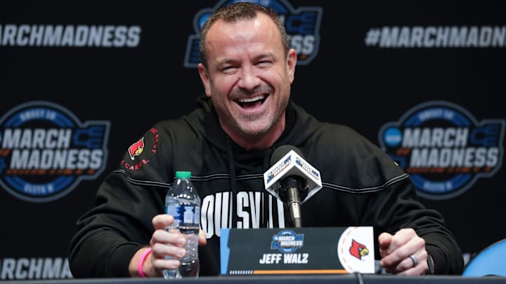 U of L head coach Jeff Walz laughs as he teased ESPN reporter Alexa Philippou about picking the Cardinals to lose in the first round of the NCAA tournament during a press conference ahead of U of L s Elite 8 matchup with Iowa at the Climate Pledge Arena in Seattle, Wa. on Mar. 25, 2023. Philippou clarified that she thought it might be a possible upset win for Drake.
Cards Presser01 Sam U of L head coach Jeff Walz laughs as he teased ESPN reporter Alexa Philippou about picking the Cardinals to lose in the first round of the NCAA tournament during a press conference ahead of U of L s Elite 8 matchup with Iowa at the Climate Pledge Arena in Seattle, Wa. on Mar. 25, 2023. Philippou clarified that she thought it might be a possible upset win for Drake.
Cards Presser01 Sam