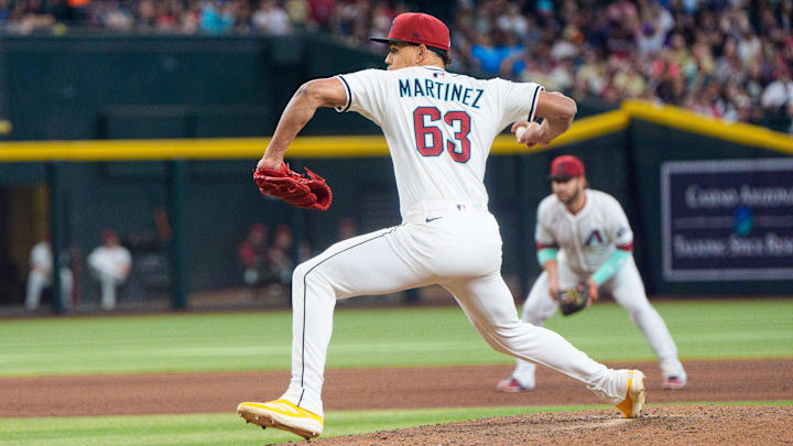 Apr 13, 2025; Phoenix, Arizona, USA;  Arizona Diamondbacks pitcher Justin Martinez (63) on the mound in the eighth against the Milwaukee Brewers at Chase Field. Mandatory Credit: Allan Henry-Imagn Images