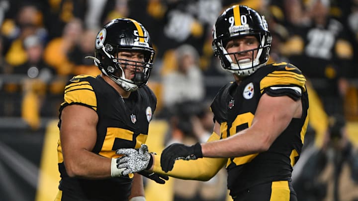 Oct 28, 2024; Pittsburgh, Pennsylvania, USA; Pittsburgh Steelers linebacker Alex Highsmith (56) celebrates with  T.J. Watt (90) after sacking New York Giants quarterback Daniel Jones (8) during the third quarter at Acrisure Stadium. Mandatory Credit: Barry Reeger-Imagn Images