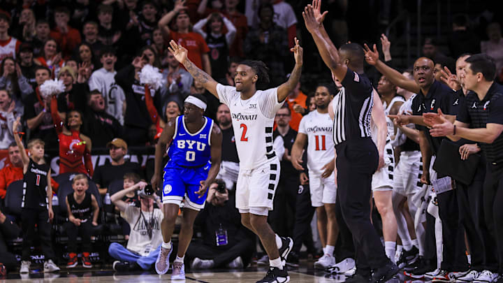 Feb 8, 2025; Cincinnati, Ohio, USA; Cincinnati Bearcats guard Jizzle James (2) reacts after a play against the Brigham Young Cougars in the second half at Fifth Third Arena. Mandatory Credit: Katie Stratman-Imagn Images