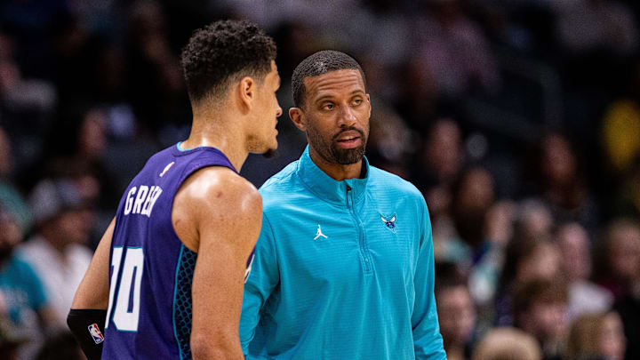 Mar 1, 2025; Charlotte, North Carolina, USA; Charlotte Hornets head coach Charles Lee talks to guard Josh Green (10) during the first quarter against the Washington Wizards at Spectrum Center. Mandatory Credit: Scott Kinser-Imagn Images