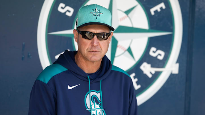 Mar 15, 2025; Peoria, Arizona, USA; Seattle Mariners manager Dan Wilson against the San Diego Padres during a spring training game at Peoria Sports Complex. Mandatory Credit: Mark J. Rebilas-Imagn Images Mar 15, 2025; Peoria, Arizona, USA; Seattle Mariners manager Dan Wilson against the San Diego Padres during a spring training game at Peoria Sports Complex. Mandatory Credit: Mark J. Rebilas-Imagn Images