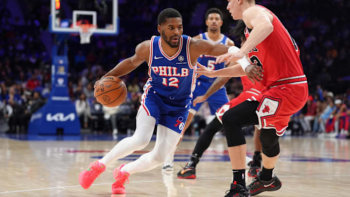 Apr 13, 2025; Philadelphia, Pennsylvania, USA; Philadelphia 76ers guard Jared Butler (12) drives against Chicago Bulls guard Kevin Huerter (13) in the first quarter at Wells Fargo Center. Mandatory Credit: Kyle Ross-Imagn Images Apr 13, 2025; Philadelphia, Pennsylvania, USA; Philadelphia 76ers guard Jared Butler (12) drives against Chicago Bulls guard Kevin Huerter (13) in the first quarter at Wells Fargo Center. Mandatory Credit: Kyle Ross-Imagn Images