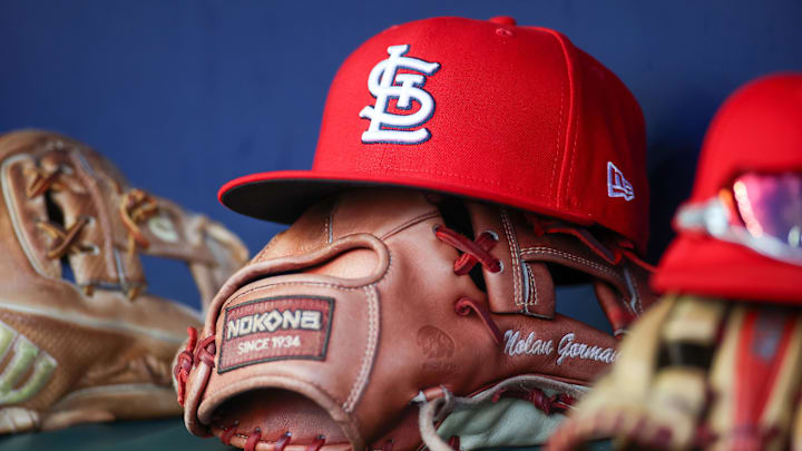 Sep 5, 2023; Atlanta, Georgia, USA; A detailed view of the hat and glove of St. Louis Cardinals second baseman Nolan Gorman (not pictured) before a game against the Atlanta Braves at Truist Park. Mandatory Credit: Brett Davis-Imagn Images