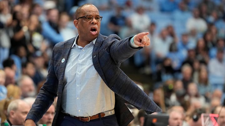 Mar 1, 2025; Chapel Hill, North Carolina, USA;  North Carolina Tar Heels head coach Hubert Davis reacts in the first half at Dean E. Smith Center. Mandatory Credit: Bob Donnan-Imagn Images
