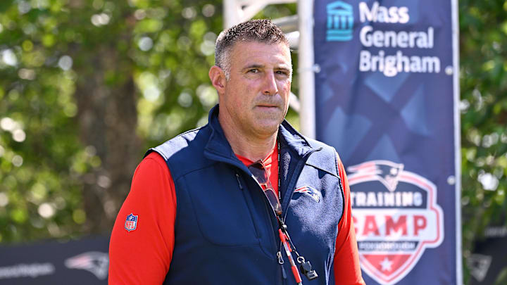 Jul 28, 2025; Foxborough, MA, USA; New England Patriots head coach Mike Vrabel heads to the practice fields for training camp at Gillette Stadium. Mandatory Credit: Eric Canha-Imagn Images