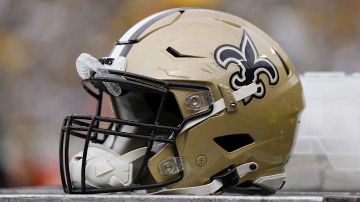 Sep 24, 2023; Green Bay, Wisconsin, USA;  An New Orleans Saints helmet during warmups prior to the game against the Green Bay Packers at Lambeau Field. Mandatory Credit: Jeff Hanisch-Imagn Images