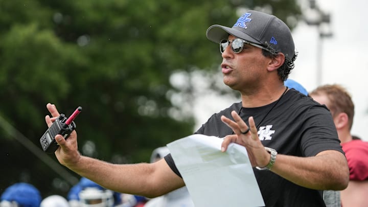 New Kentucky offensive coordinator Bush Hamdan coaches during practice Friday. August 2, 2024 in Lexington. Hamdan came from Boise State; he's also coached at Missouri, the Atlanta Falcons and Florida as well.